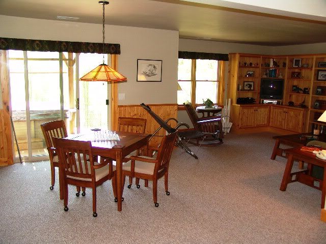 The game room downstairs boasts a hot-tub on the porch for those cool nights, Blue Ridge Mountain Property, Log Homes in Franklin NC